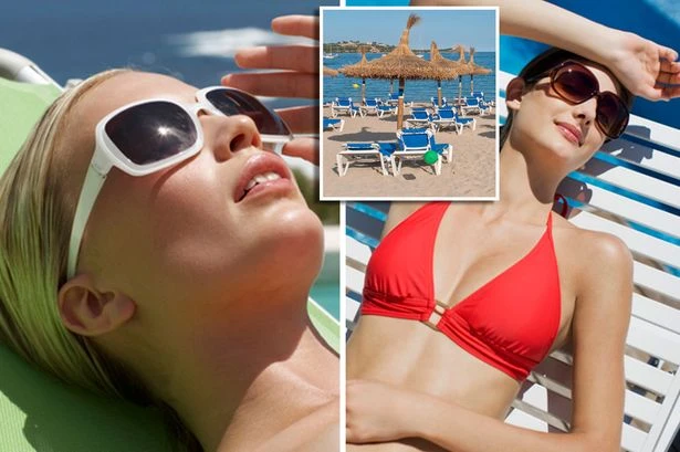 Germans declare victory in sunbeds war as 400,000 sun it up in Majorca while Brits wait