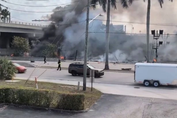 Boca Raton plane crash: Multiple dead with cars on fire and people told 'stay away'