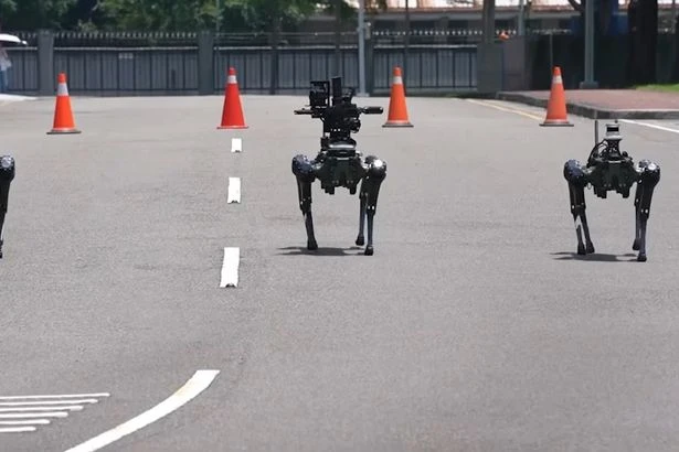 'Terminator' robot dogs armed with machine guns deployed to help stop an invasion by Chinese army