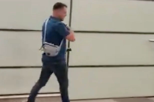 Tommy Robinson boards 'flight out of the country' after assault probe at station