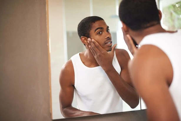 Blokes should get pedicures and carry bags if they want to be 'modern men'