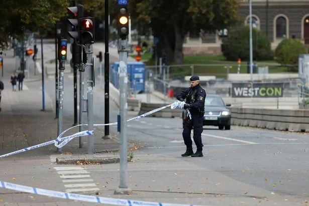 'Ruthless' mass shooting left 'blood trail' on streets as restaurant owner aided victims
