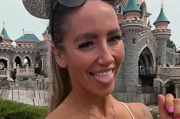 Braless mum rocks playsuit for Disneyland trip - but her outfit is branded 'inappropriate'