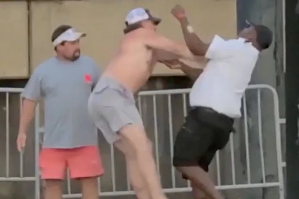Mass 'WWE-style' brawl in riverside town sees chair-swinging scrapper dubbed 'Black Aquaman'