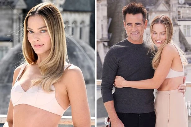 Margot Robbie wows in bra top as co-star Colin Farrell covers up in warm jumper