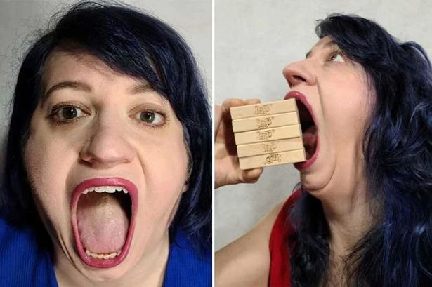 Big mouth woman breaks world record for biggest gob in incredible pics