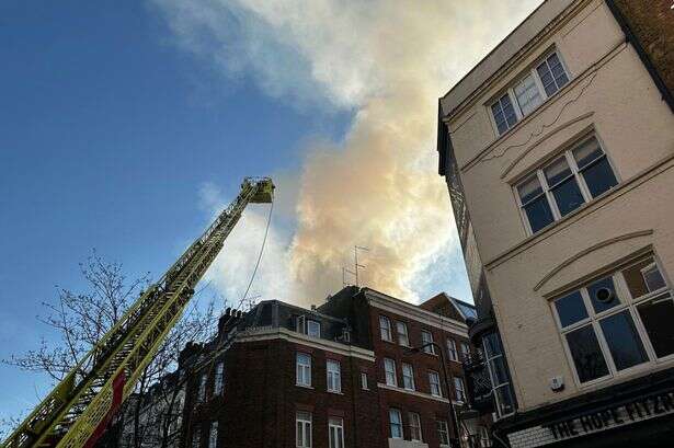 Roaring London fire fills sky with smoke as 40 firefighters rush to battle blaze