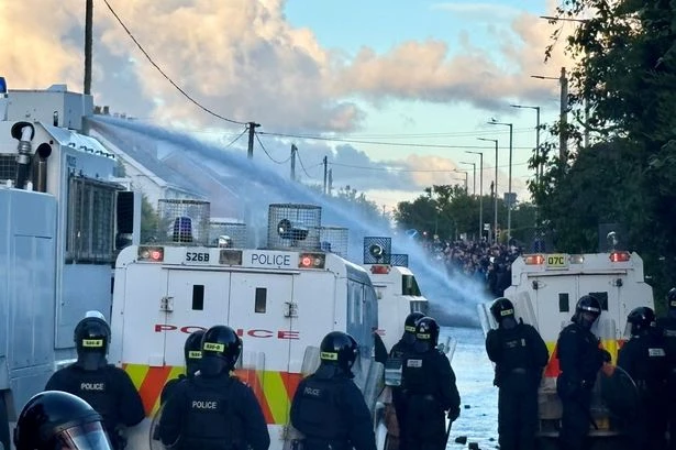 Belfast rioters blasted with water cannons as more carnage breaks out on streets