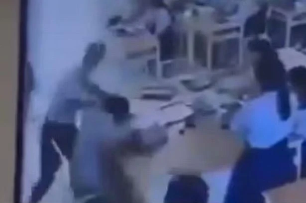 Student attacks teacher in horror caught on camera as she's left with broken ribs