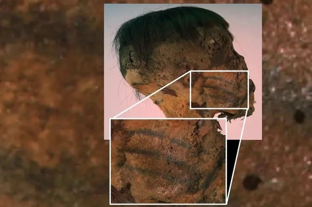 Face tattoos on mystery mummy baffle archaeologists as origins shrouded in mystery