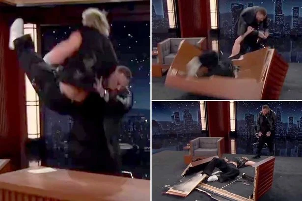 Jelly Roll chokeslams Logan Paul through table as The Undertaker's tips pay off