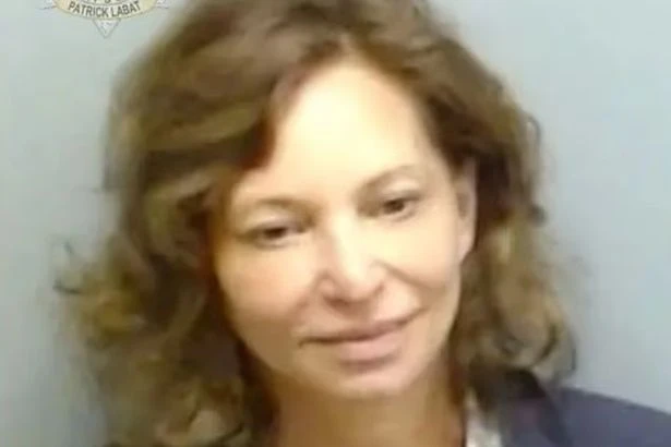 Smiling female teacher 'groomed pupil, 16, and planned to flee country with him'
