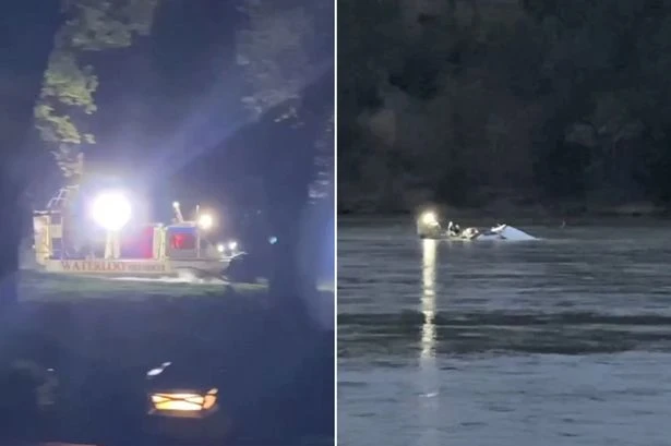 Three dead after plane crashes down into river as emergency services pile in