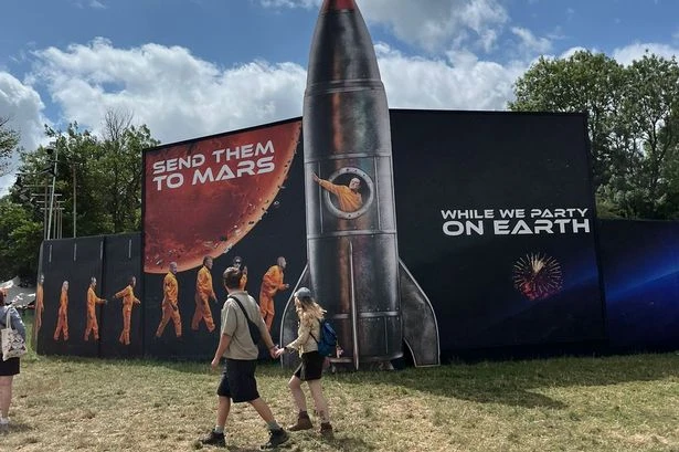 PIC OF THE DAY: Villains Trump, Musk and Lettuce Liz Truss 'sent to Mars' in Glastonbury stunt