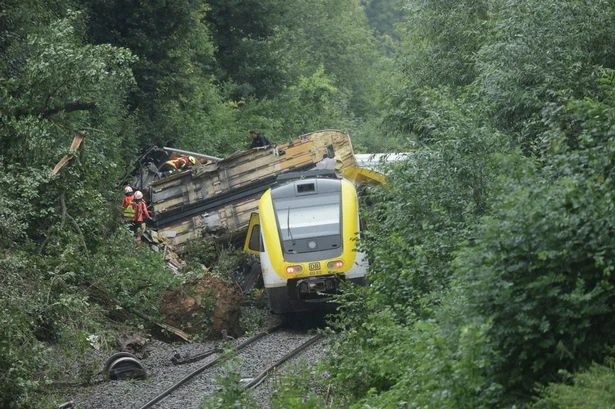 Passenger train derails as those stuck inside heard screaming in 'mass casualty incident'