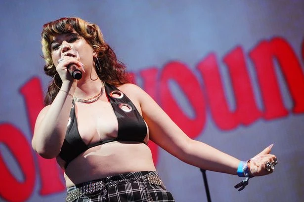 Glastonbury star Lola Young says 'red flag' in men is also 'hot' and admits to Nike rule