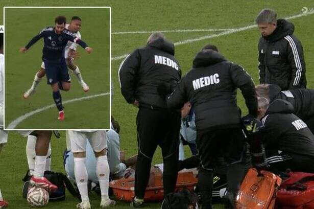 Arsenal star goes off injured on stretcher vs Man Utd in big blow to title hopes