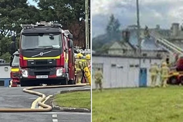 Hospital 'on fire' as over 50 firefighters rush to tackle the blaze