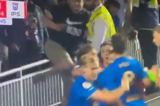 Birmingham fan hauled to ground in player bust-up as fans say 'football is back'