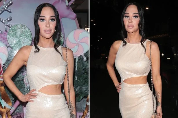 N-Dubz star Tulisa wows fans as she flashes toned abs in cut-out mini-dress