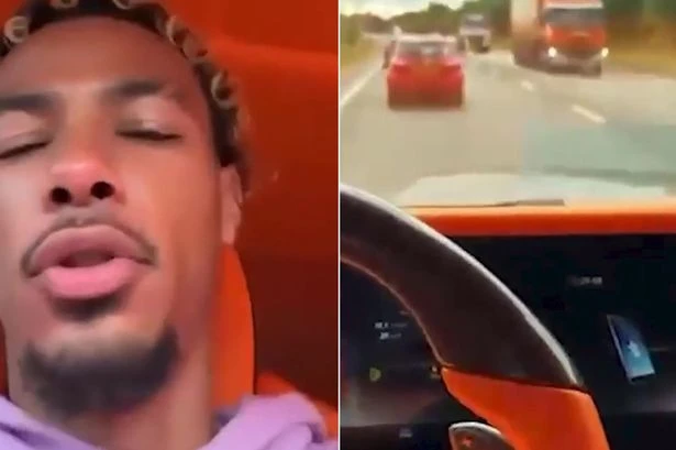 Idiot Liverpool star films himself on his phone driving £200k Merc before Snapchat post