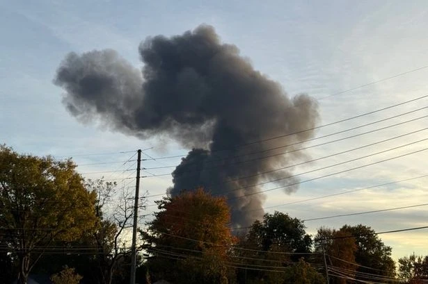 Horror plane crash with plumes of smoke seen for miles as cops swarm scene