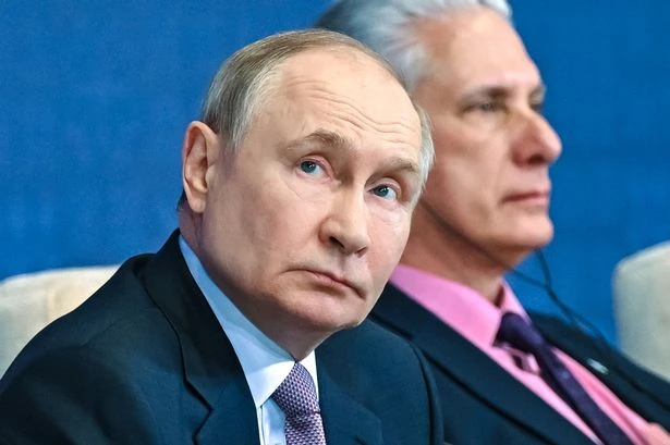 Putin issues weird 'I majored in Law' warning to Keir Starmer as he claims UK has 'robbed' Russia