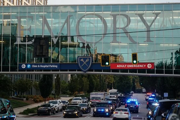 University shooting sees cop with pregnant wife shot dead in horror standoff