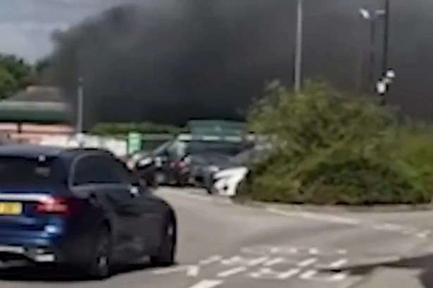 Huge blaze breaks out at Morrisons petrol station as police close off road