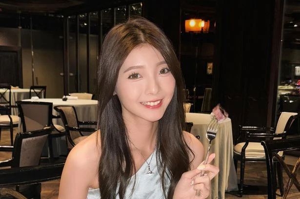 Star cheerleader stabbed in neck by alleged obsessed fan at modelling event