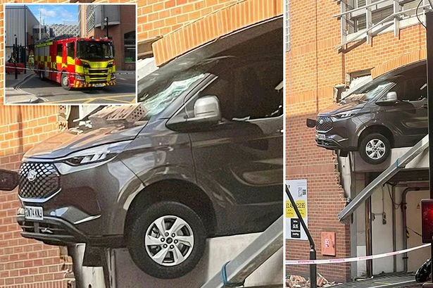 Ford Transit van overhangs multi-storey car park as people rushed to hospital