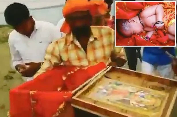 Incredible moment baby girl is found alive floating in wooden box on river