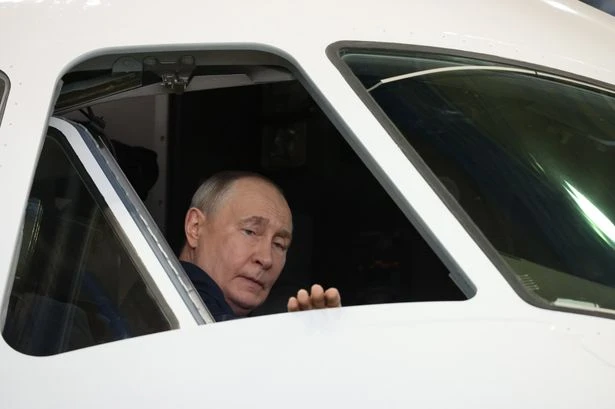Weirdest Vladimir Putin outing ever as despot lovingly strokes a cockpit during inspection