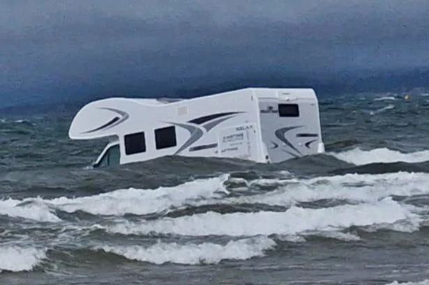 Doomed bid to save campervan swamped by sea at popular UK beach