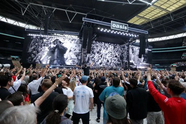 Oasis Wembley gig 'security breach as 200 ticketless fans sneak in disabled door'