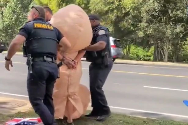 Police arrest 'penis woman' who goes floppy when authorities try and catch her