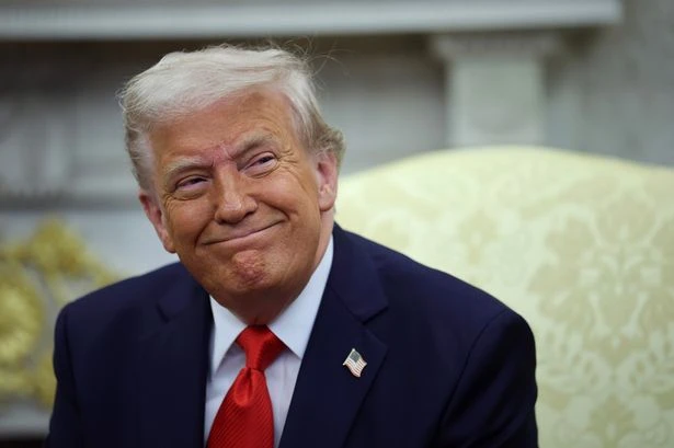 Ukraine signs Trump's minerals deal as Odesa governor reports 'a lot of damage' to residential area