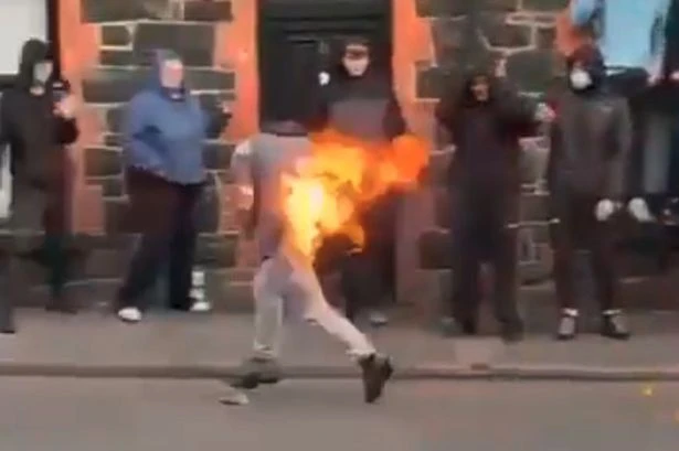 Idiot rioter accidentally sets him self on fire after Molotov cocktail disaster in Ballymena