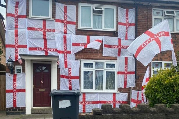 Footie-mad dad threatened to have windows smashed for flying 23 England flags for Euros