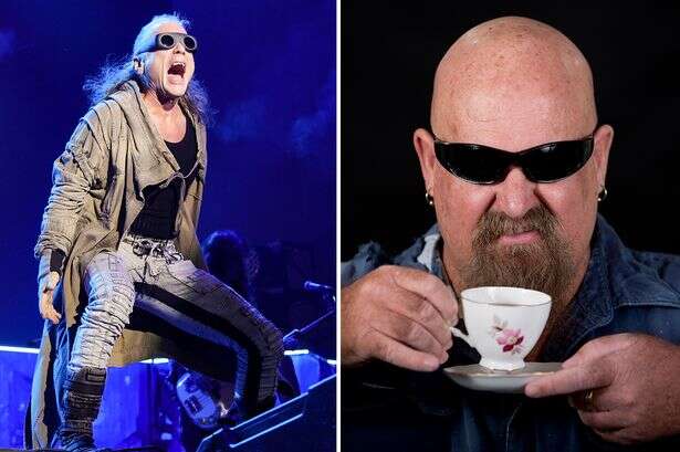 Iron Maiden legend Bruce Dickinson sneaks off stage for a cup of tea during guitar solos