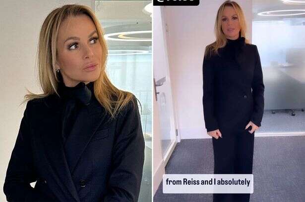 Amanda Holden mistaken for 'air hostess' as she slips into sexy all-navy suit