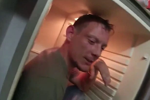 'Violent bully' found hiding from police inside fridge after abusing partner