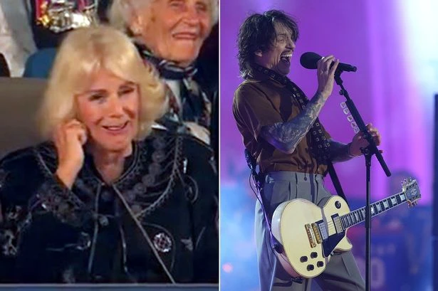 Queen Camilla appears to cover her ears as VE Day concert takes strange turn