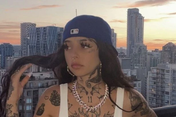 Tattoo model flooded with marriage proposals as she slips into teeny-tiny bikini