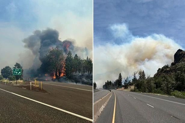 Out-of-control wildfire sparks evacuation as 2,178 homes threatened in 'human-caused' blaze
