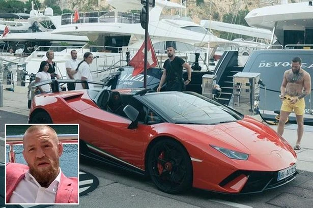Conor McGregor flaunts £220k red Lamborghini before warning he'll 