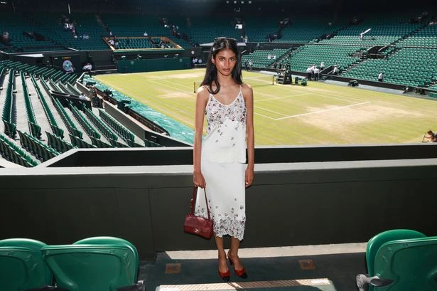 Iconic Chanel model stuns during private Wimbledon centre court photo shoot