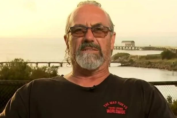 Surfer left with gruesome 11-inch scar after great white shark 'chomped' on him