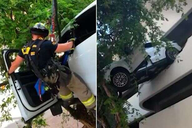 Porsche left dangling off high-rise car park as woman only saved thanks to a tree