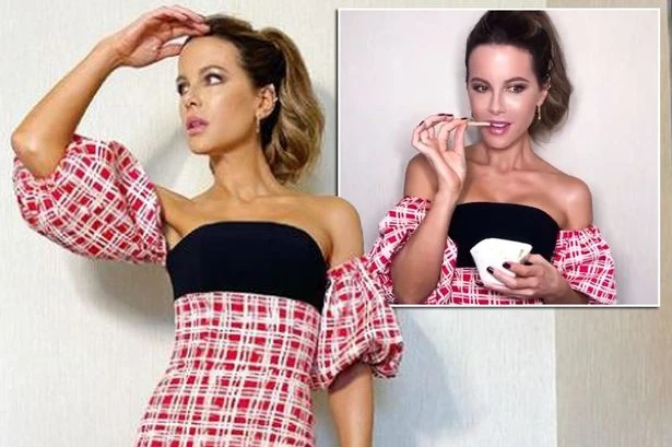 Kate Beckinsale, 47, flaunts curves in dress held up by luck as she turns pin-up